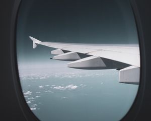 Preview wallpaper porthole, window, wing, plane, view