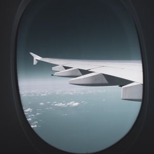 Preview wallpaper porthole, window, wing, plane, view