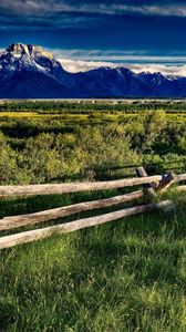 Preview wallpaper protection, fence, mountains, fields, grass, sky, silence, landscape