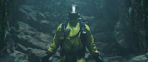 Preview wallpaper protective suit, gas mask, cave, rocks