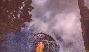 Preview wallpaper puddle, foot, boot, reflection, water