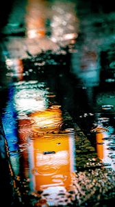 Preview wallpaper puddle, rain, drops, neon, reflection, lights