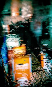 Preview wallpaper puddle, rain, drops, neon, reflection, lights