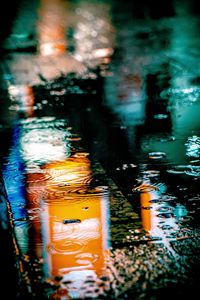 Preview wallpaper puddle, rain, drops, neon, reflection, lights