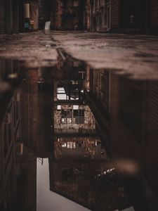 Preview wallpaper puddle, water, reflection, building