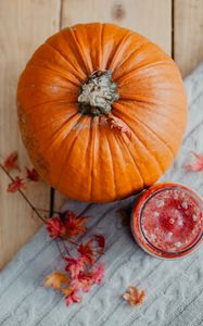 Preview wallpaper pumpkin, fruit, orange, candle, leaves