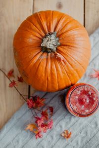 Preview wallpaper pumpkin, fruit, orange, candle, leaves