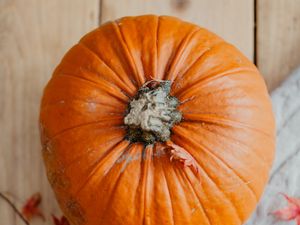 Preview wallpaper pumpkin, fruit, orange, candle, leaves