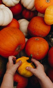 Preview wallpaper pumpkin, hands, child, autumn