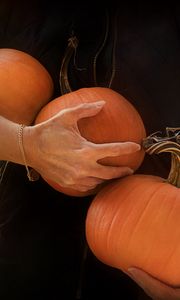 Preview wallpaper pumpkin, hands, orange, autumn