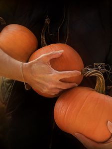 Preview wallpaper pumpkin, hands, orange, autumn