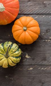 Preview wallpaper pumpkins, autumn, boards, wood