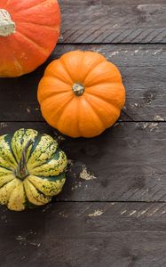 Preview wallpaper pumpkins, autumn, boards, wood