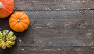 Preview wallpaper pumpkins, autumn, boards, wood