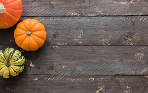 Preview wallpaper pumpkins, autumn, boards, wood