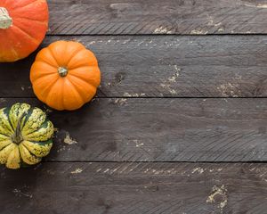 Preview wallpaper pumpkins, autumn, boards, wood