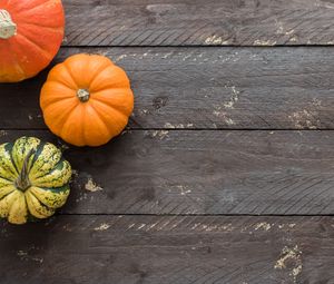 Preview wallpaper pumpkins, autumn, boards, wood