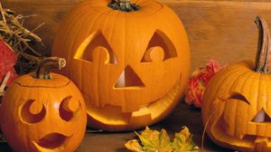 Preview wallpaper pumpkins, leaves, candles, halloween, holiday