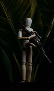 Preview wallpaper puppet, figurine, machine gun, weapon