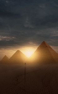 Preview wallpaper pyramids, sun, desert, silhouette, sunset
