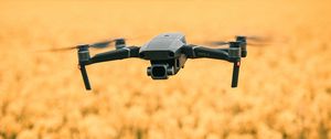 Preview wallpaper quadcopter, drone, flight, flowers, yellow, field