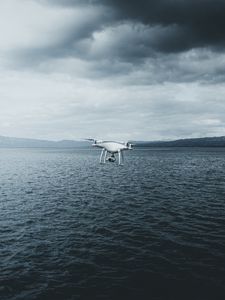 Preview wallpaper quadcopter, drone, quadrotor helicopter, quadrotor, sea, fog, clouds