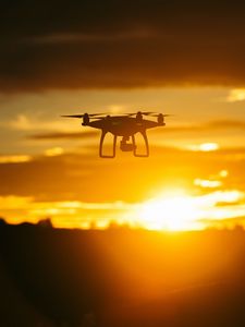 Preview wallpaper quadrocopter, sunset, sky, flight, drone