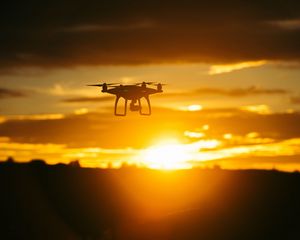 Preview wallpaper quadrocopter, sunset, sky, flight, drone