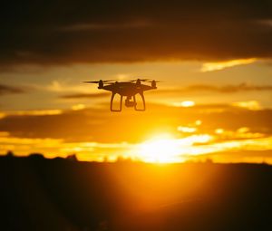 Preview wallpaper quadrocopter, sunset, sky, flight, drone