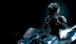 Preview wallpaper racer, black, motorcycle, helmet