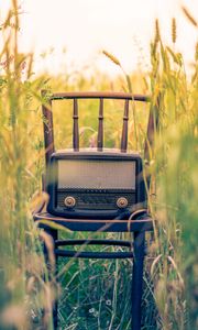 Preview wallpaper radio, chair, grass, blur