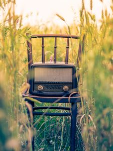 Preview wallpaper radio, chair, grass, blur