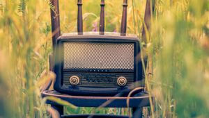 Preview wallpaper radio, chair, grass, blur