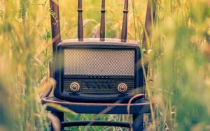 Preview wallpaper radio, chair, grass, blur