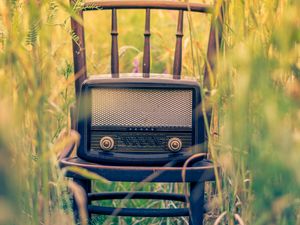 Preview wallpaper radio, chair, grass, blur