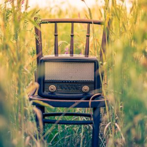 Preview wallpaper radio, chair, grass, blur