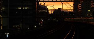 Preview wallpaper railroad, rails, dark, city, dusk