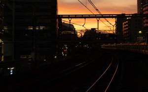Preview wallpaper railroad, rails, dark, city, dusk