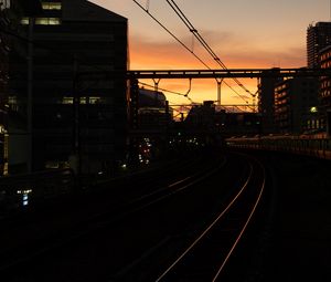 Preview wallpaper railroad, rails, dark, city, dusk