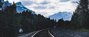 Preview wallpaper railroad, rails, mountains, trees, clouds