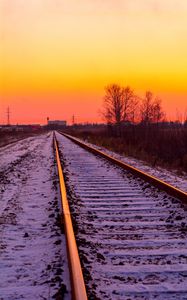 Preview wallpaper railroad, rails, snow, sunset