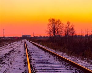 Preview wallpaper railroad, rails, snow, sunset