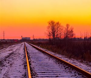 Preview wallpaper railroad, rails, snow, sunset