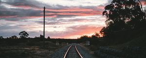 Preview wallpaper railroad, rails, sunset, pebbles, turn
