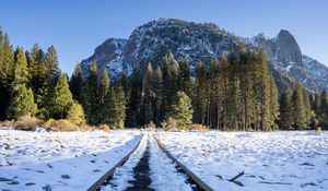 Preview wallpaper railroad, snow, glade, trees, mountains