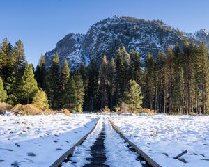 Preview wallpaper railroad, snow, glade, trees, mountains