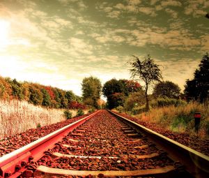 Preview wallpaper railroad, town, road, nature, sky, trees