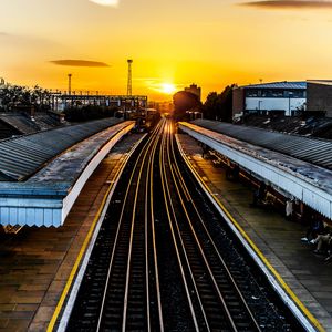 Preview wallpaper railroad, train, sunset