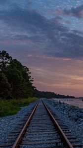 Preview wallpaper rails, railroad, coast, twilight