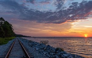 Preview wallpaper rails, railroad, coast, twilight